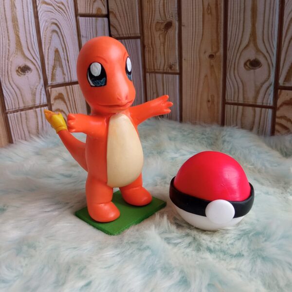 Charmander — Charmander con su base, en porcelana fría.