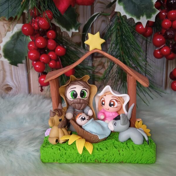 Pesebre casita — Nacimiento en casita decorada, ideal para mesa o repisa.